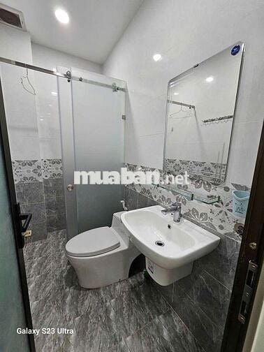 Nhà Mới 5x20 1hầm xe hơi. 3lầu Sân Thượng 5pn 5wc