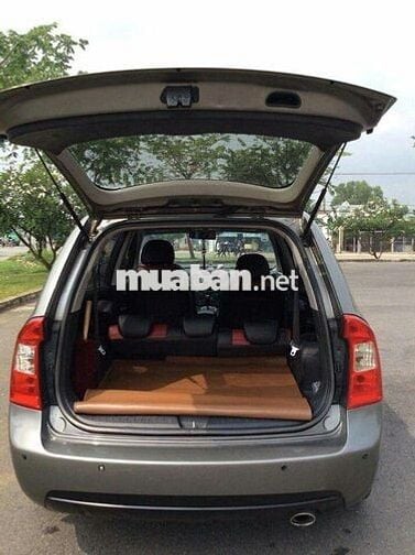 Kia Carens 7 chỗ số tự động màu xám 2010