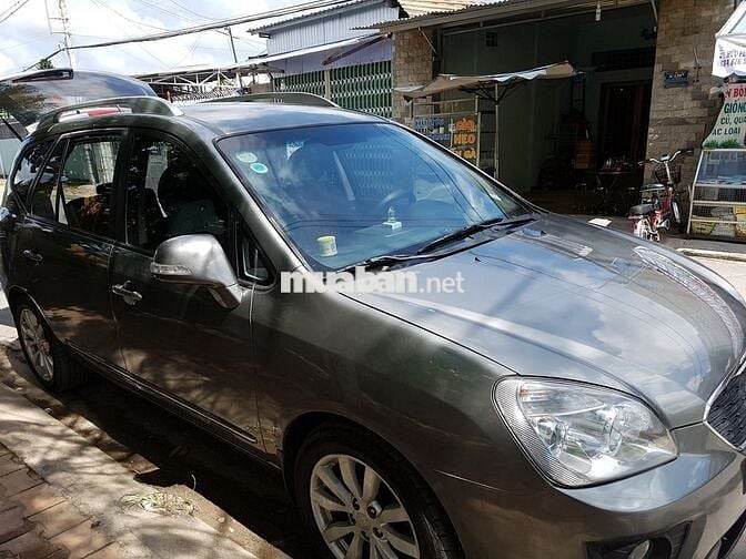 Kia Carens 7 chỗ số tự động màu xám 2010