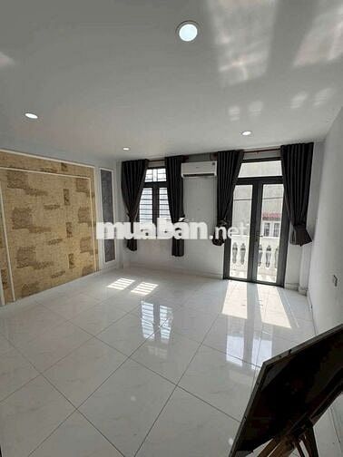 Nhà Quang Trung P10 3 lầu 4pn Ngay Ub Quận