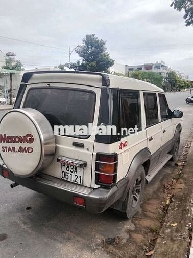 Bán xe 7 chỗ máy dầu,2 cầu còn đủ