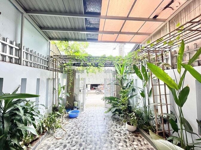 Bán căn nhà lầu trệt đẹp gần chợ dĩ an 1