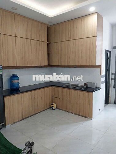 Nhà 2mt trước sau hẻm 6m thông 4x14m 2lầu 4pn 3wc. Pham van Chieu gv