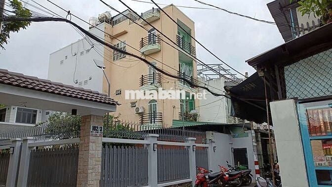 Cần bán gấp nhà P ĐHT Q12.DT 5 x25.  1 trệt 4 lầu 12PN 12 WS xe hơi