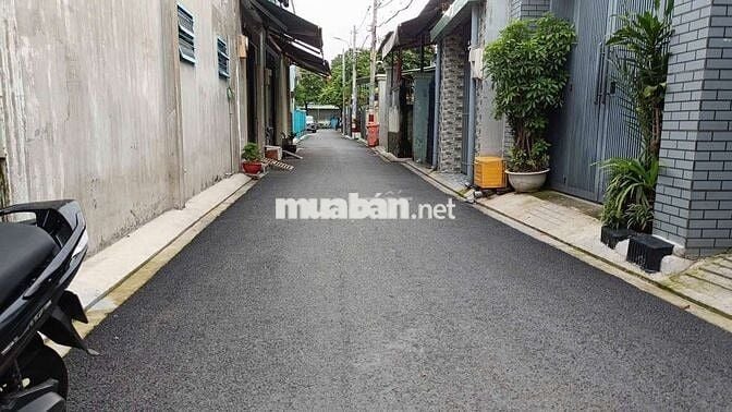 Cần bán gấp nhà P ĐHT Q12.DT 5 x25.  1 trệt 4 lầu 12PN 12 WS xe hơi