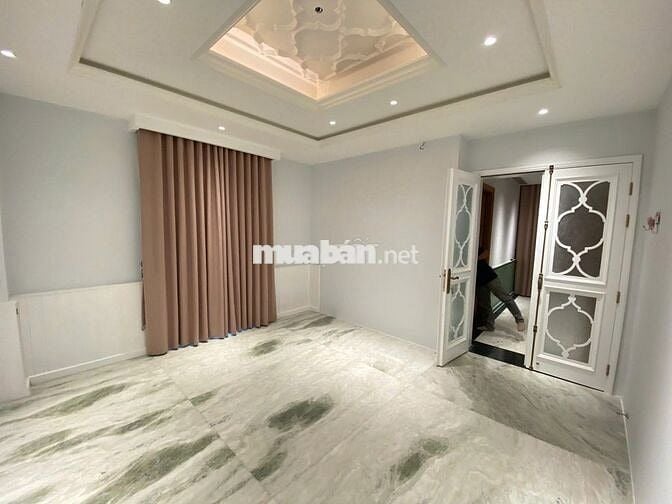 CHO THUÊ NHÀ GÓC 2MT HOA ĐÀO QPN, DT 10x15M, HẦM TRỆT 2 LẦU, GIÁ 85TR