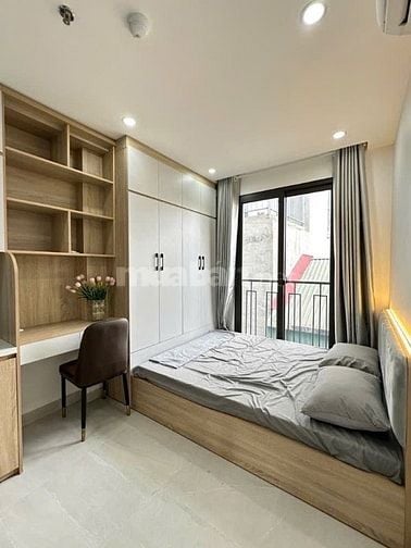 Bán tòa căn hộ dịch vụ Đặng Văn Ngữ, Dt 70m2, 7t, mt 5.3m, 1.5 tỷ/năm.