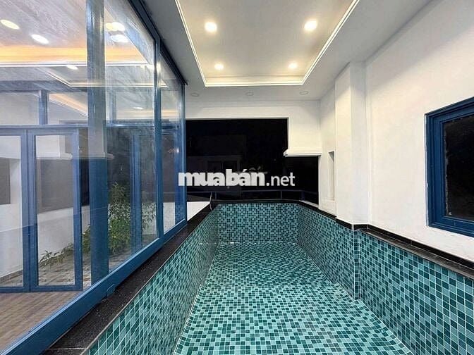 Biệt thự góc 2 MT sát Nguyễn Văn Trỗi 75m2 6 tầng hầm thang máy hồ bơi