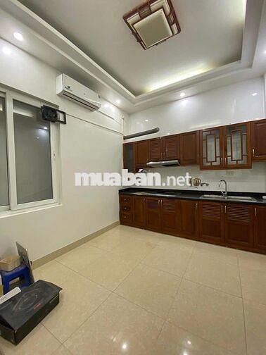 Cho thuê nhà phân lô ngõ 23 phố Đỗ Quang, Dt 52m x 5 tầng đường 8m