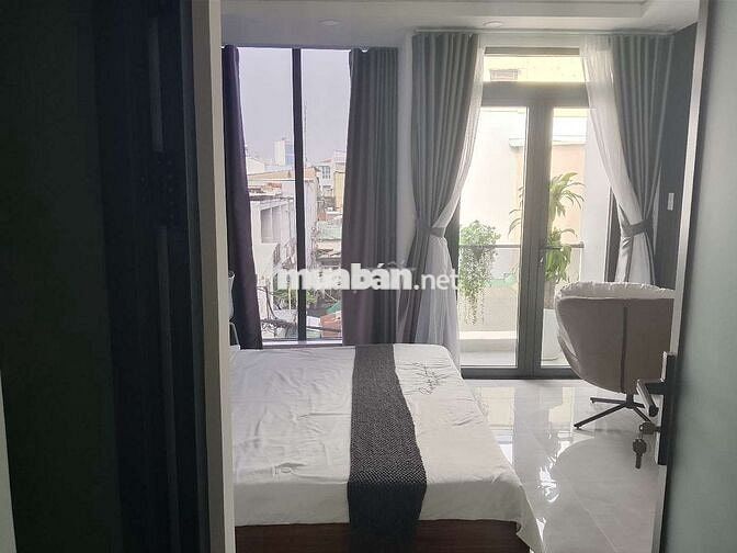 Bán nhà 4 tầng có thang máy, 4.1x15.6 Thống Nhất GV hẻm xe hơi...