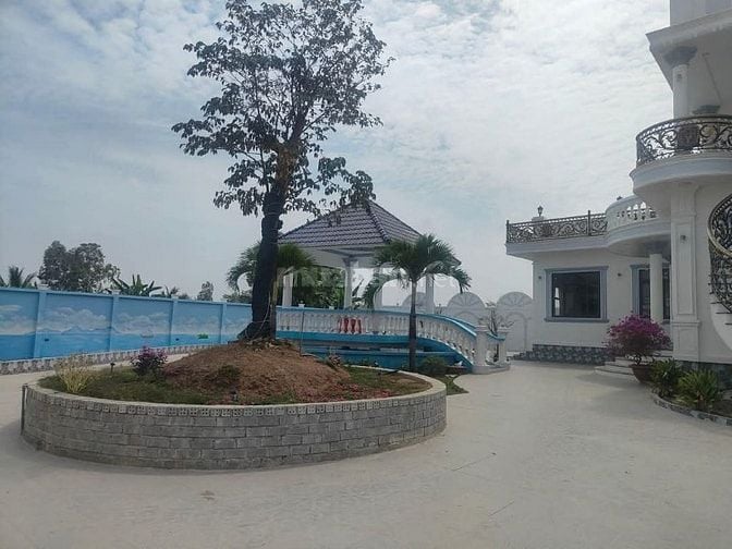 Biệt thự và đất đường DT871, Gò Công Đông. DT 4.740m2, nhà 1lầu 5PN