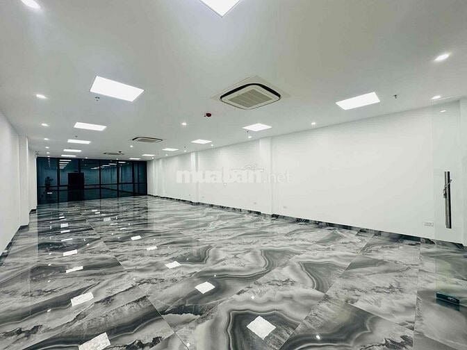 Bán tòa kính mặt phố Chùa Láng 136m², 8 tầng + hầm, MT 6.2m, 115 tỷ