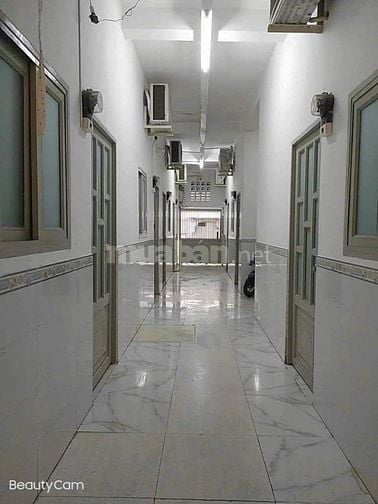 Căn Hộ Dịch Vụ trung tâm Quận 7,DT10x20m,4 Tầng 22 phòng.LH 0931432374