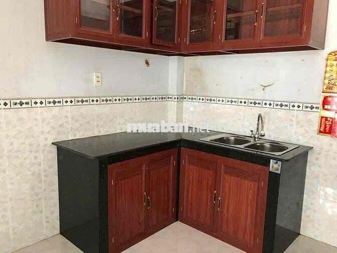 Nhà 1 trệt 2 lầu 2PN góc 2 mặt tiền hẻm xe hơi gần Phạm Văn Đồng