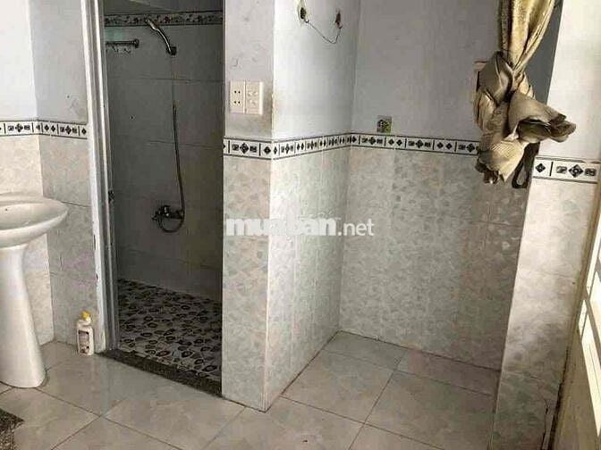 Nhà 1 trệt 2 lầu 2PN góc 2 mặt tiền hẻm xe hơi gần Phạm Văn Đồng