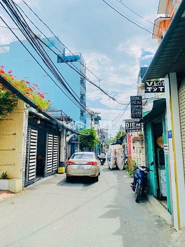 Bán nhà góc 2MT HXH 5.7x25=135m2 1T2L có sân rộng nhà sát đường lớn gi