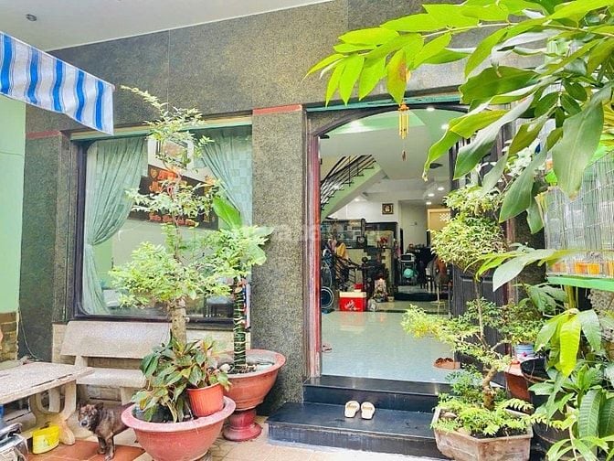 Bán nhà góc 2MT HXH 5.7x25=135m2 1T2L có sân rộng nhà sát đường lớn gi