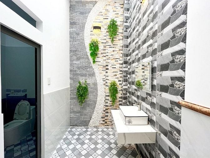 Bán nhà mặt tiền đường nhựa 12m - Cách cầu lớn 5km