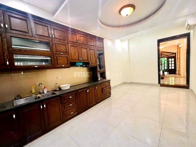 Bán nhà phân lô Hoàng Cầu 63m2,oto tránh,2thoáng,kinh doanh, 26.5tỷ. 