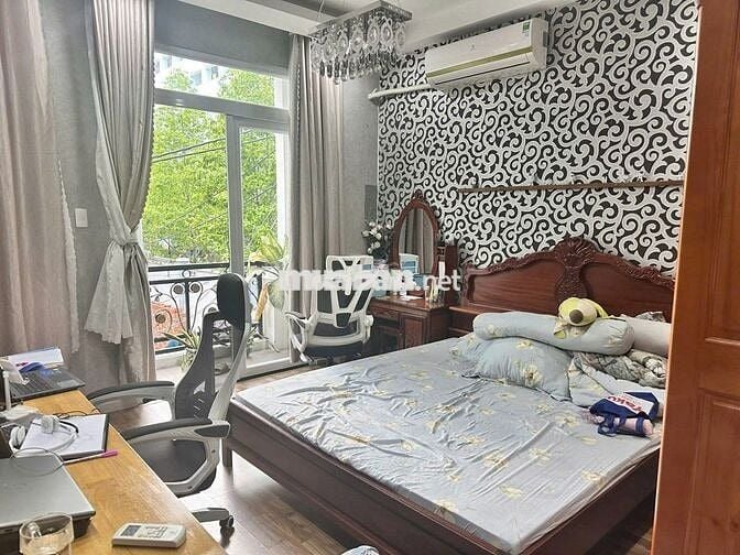 Cho thuê nhà nguyên căn trệt 2 lầu Quang Trung P.11 giá 15tr/tháng TL