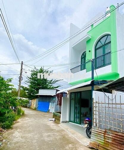 Bá  căn nhà 1 trệt 1 lầu( mới toanh ) ở Tân An Hội 125m2 SHR giá 910TR