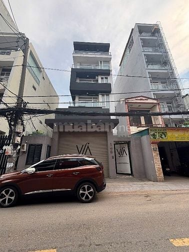 Bán Toà Nhà Mặt Tiền Đường Nguyễn Cửu Vân, P17, BT, Giáp Q1, HĐT 210tr
