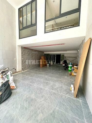 Bán nhà Bùi Xương Trạch, ô tô vào nhà 7 tầng, MT5m, gồm 19P ngủ, 20 tỷ