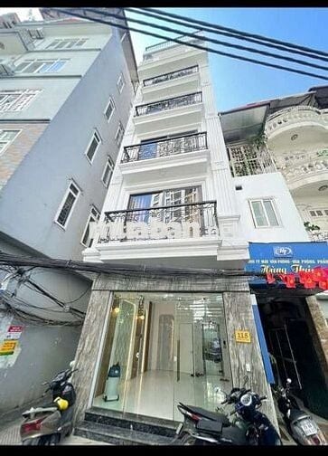 Tôi cần bán nhà mặt phố Cự Lộc 7tầng tầng thang máy full nội thất.