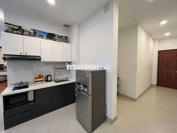 Căn hộ 55m2 1pn full nội thất mặt tiền Hồ Hảo Hớn - Q1