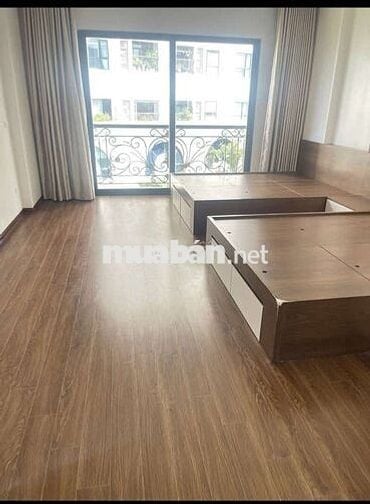 Tôi cần bán nhà mặt phố Cự Lộc 7tầng tầng thang máy full nội thất.