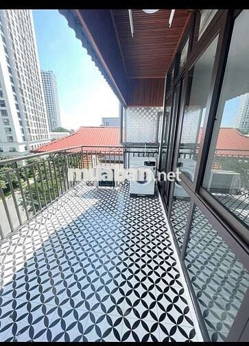 Tôi cần bán nhà mặt phố Cự Lộc 7tầng tầng thang máy full nội thất.