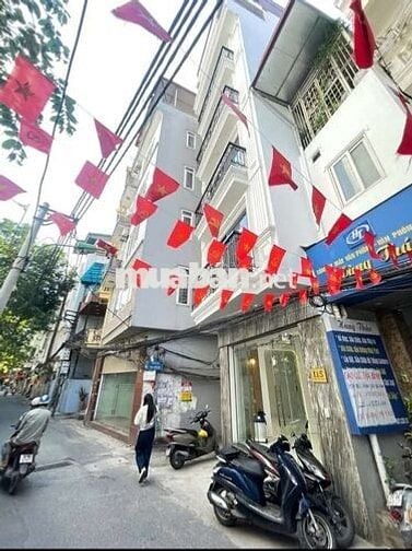 Tôi cần bán nhà mặt phố Cự Lộc 7tầng tầng thang máy full nội thất.