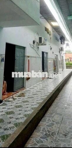 Bán dãy trọ5P 1Kiot gần nhà máy nước Tân Hiệp 125m2 SHR giá 1 tỉ 240tr
