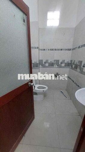 Nhà Mới Đẹp đg Qtrung P10: 4x7m, 2 lầu, 2pn, 3wc, sân thượng