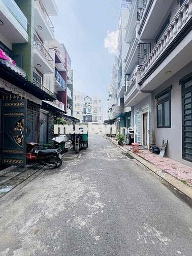 nhà cần bán 4x15m 4 tầng, hẻm xe hơi gần trường Kim Đồng, gần chợ