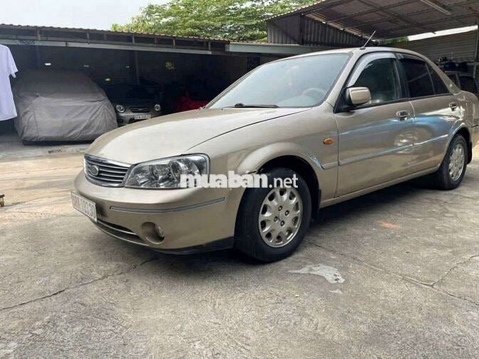 Ford Laser Vàng cát Số sàn