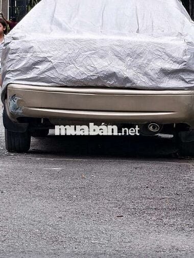 Ford Laser Vàng cát Số sàn