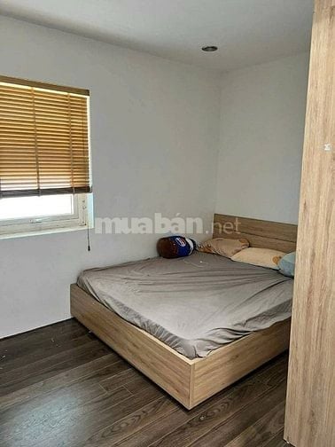 nhà 4 tầng 10 phòng.4,5x16m.HDT 50tr/tháng. Đường nhựa 8m sát mặt tiền