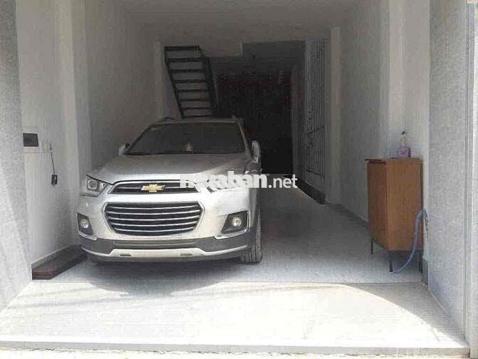 Cho thuê nhà 1 trệt 3 lầu thiết kế thoáng ô tô đậu trong nhà hẻm QL 13