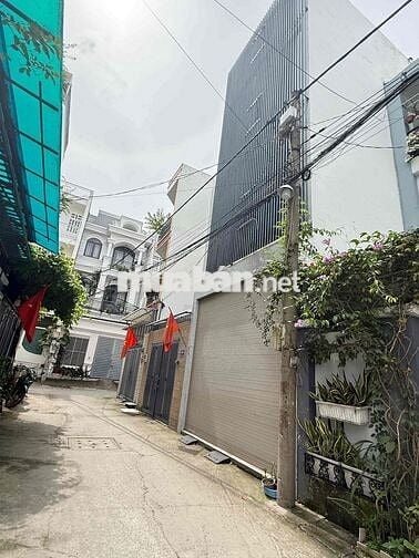 Cho thuê nhà 1 trệt 3 lầu thiết kế thoáng ô tô đậu trong nhà hẻm QL 13