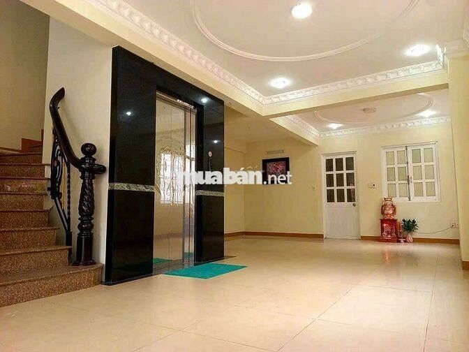 MẶT TIỀN TOÀ NHÀ SANG TRỌNG CÓ THANG MÁY