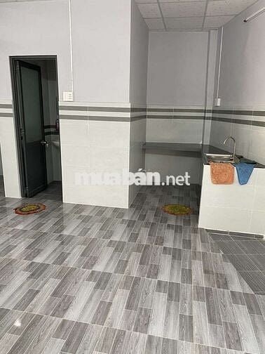 Cho thuê nhà trệt+lửng 4×14  nở hậu mặt tiền đường nguyễn cửu phú