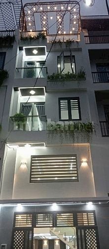 Bán nhà xây mới - Đường 7m thông - Khu nhà lầu - an ninh tốt