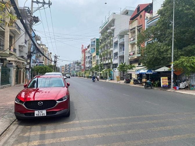 Nhà MT Đ. số 26 khu Bình Phú 4,5x25m 2 lầu 26 triệu/tháng