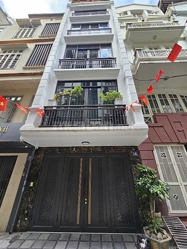 Bán nhà riêng Xuân Diệu 52m2*5T,mt 4.2m,lô góc,oto,ngõ thông,kd,19.5tỷ