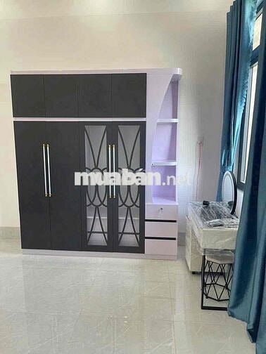 Nhà 1 trệt 1 lầu xây mới tặng nội thất trung tâm thành phố VL