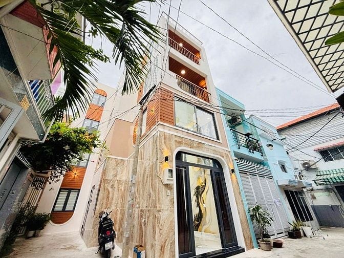 Bán nhà đẹp 5 tầng THANG MÁY 300/21/6 Nguyễn Thái Sơn p4 Gò Vấp