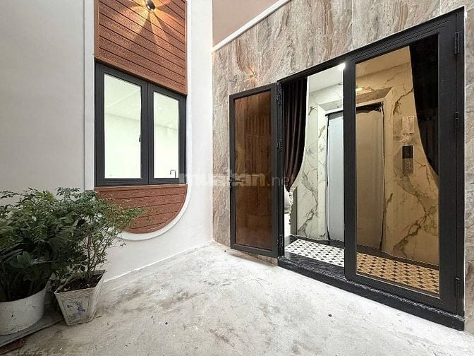 Bán nhà đẹp 5 tầng THANG MÁY 300/21/6 Nguyễn Thái Sơn p4 Gò Vấp