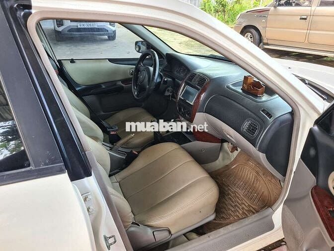 Ford laser 2004 9 chủ ký giấy gl lanos nubira