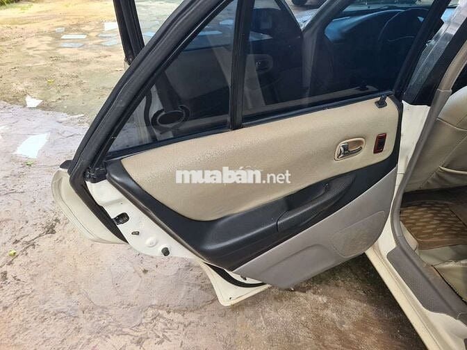 Ford laser 2004 9 chủ ký giấy gl lanos nubira